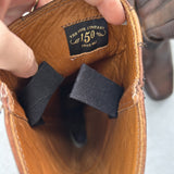 The inside of Frye cowboy boots with harness